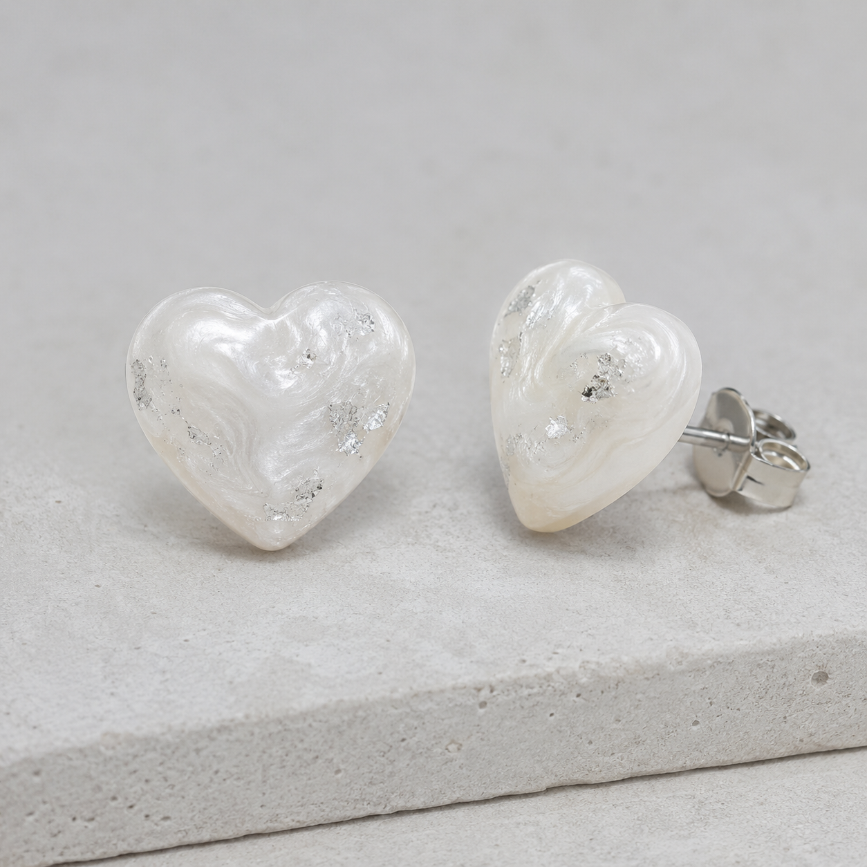 Pearl Mist pearl-white heart resin post earrings with silver accents